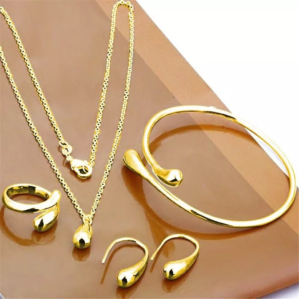 jewelry-set-non-gold-double-heart-necklace-earrings-bracelet-fashion-bridal-accessory-set-784675.webp