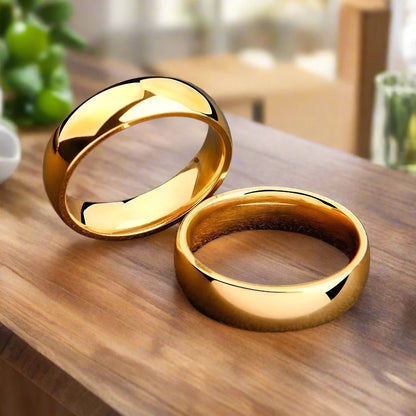 luxury-golden-engagement-wedding-couple-ring-men-and-women-jewelry-543708.webp